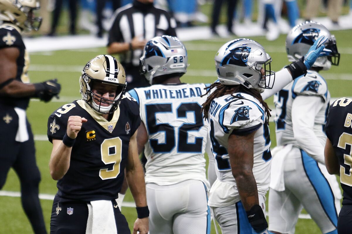 New Orleans Saints quarterback Drew Brees reacts after scoring a touchdown.