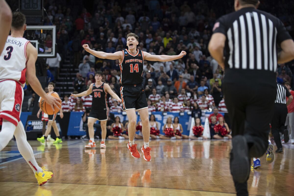 Princeton guard Matt Allocco celebrates following the team's victory over Arizona in a first-round NCAA tournament game.