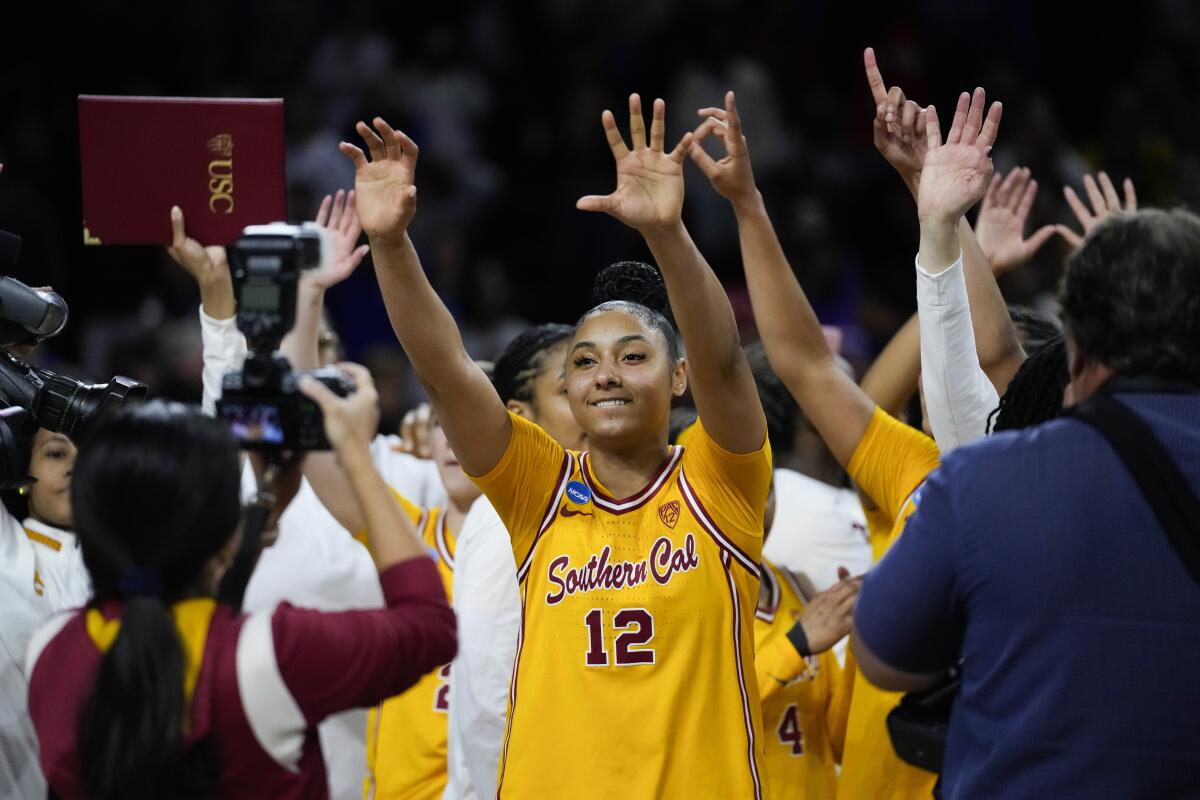 USC guard JuJu Watkins celebrates after the Trojans' win over Kansas in the second round of the NCAA tournament on March 25.