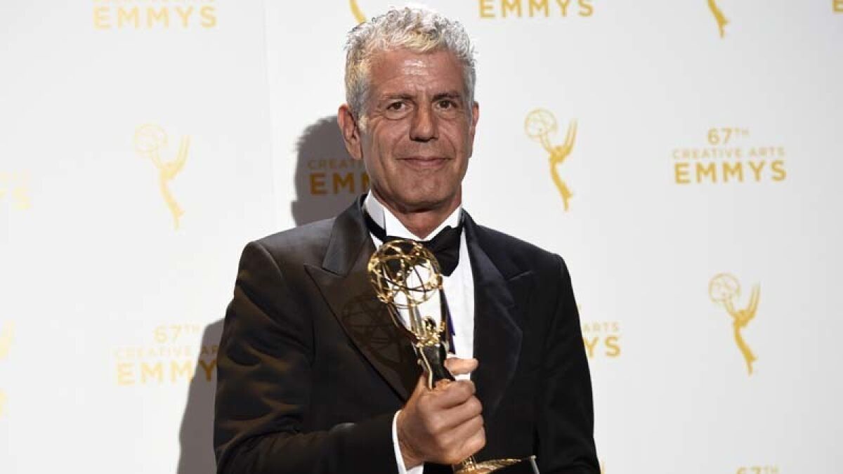 Anthony Bourdain with his Emmy in 2015.