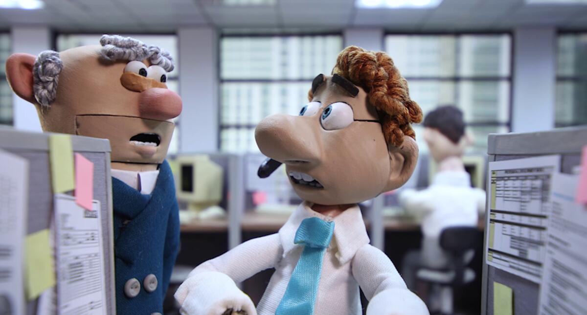 Two stop-motion men talk in an office setting in "An Ostrich Told Me the World Is Fake and I Think I Believe It."