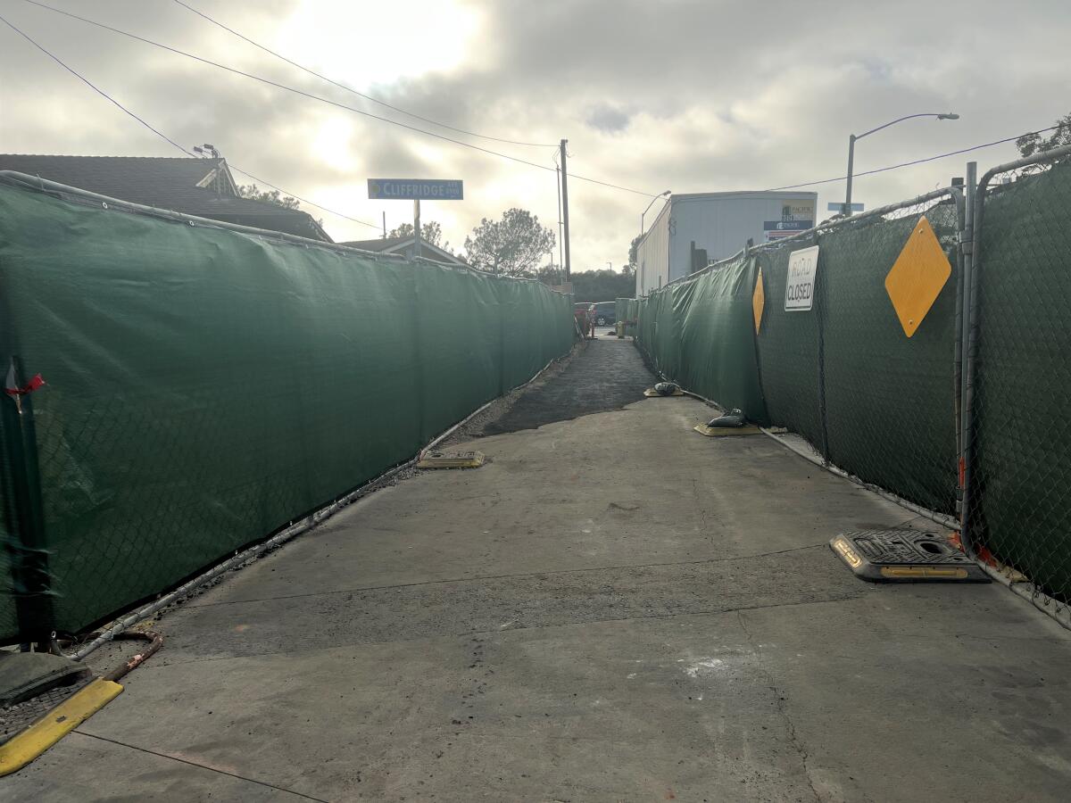 A pedestrian walkway to La Jolla Village Drive and Torrey Pines Road from La Jolla Scenic Drive North has been restored.