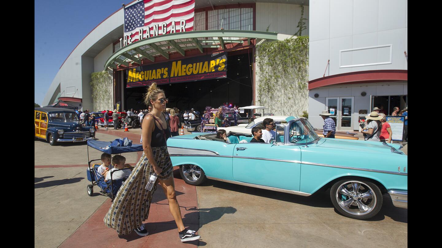 Cars cruise through the OC Fairgrounds for the 18th annual Cruisin’ for A Cure charity car show in Costa Mesa on Saturday, Sept. 23.