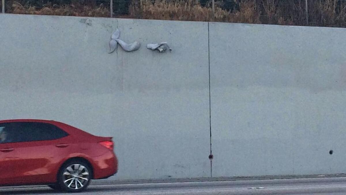 A mermaid sculpture by the art duo Bohemia Incorporated on the 10 Freeway.