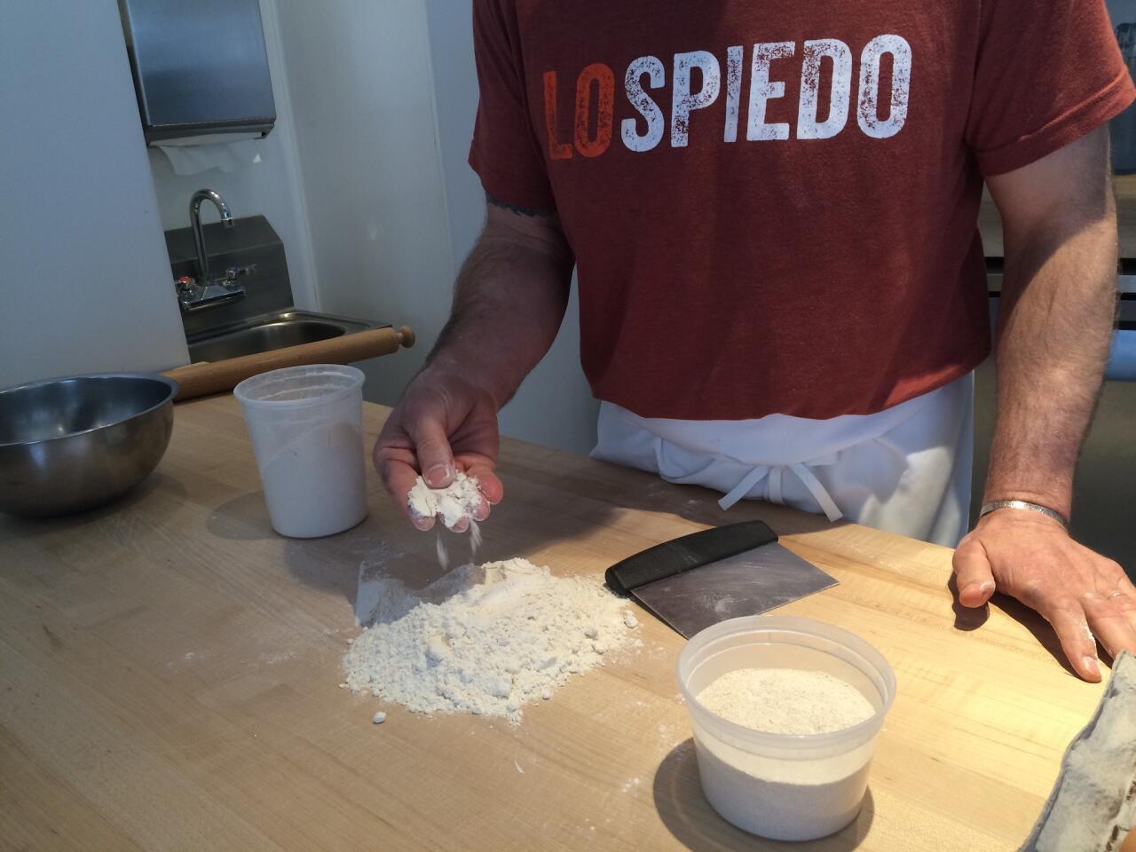 Marc Vetri touching his freshly milled flour