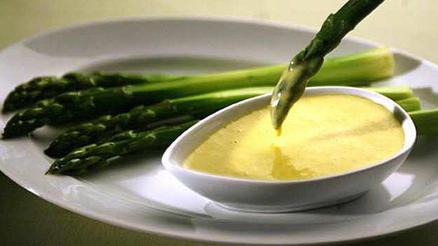 A rich, tart lemon aioli that pairs especially well with plump, seasonal asparagus. Recipe: Lemon aioli