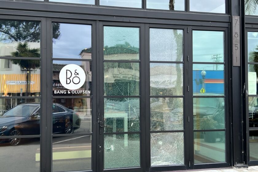 The broken window of La Jolla's Bang & Olufsen after a recent break-in.
