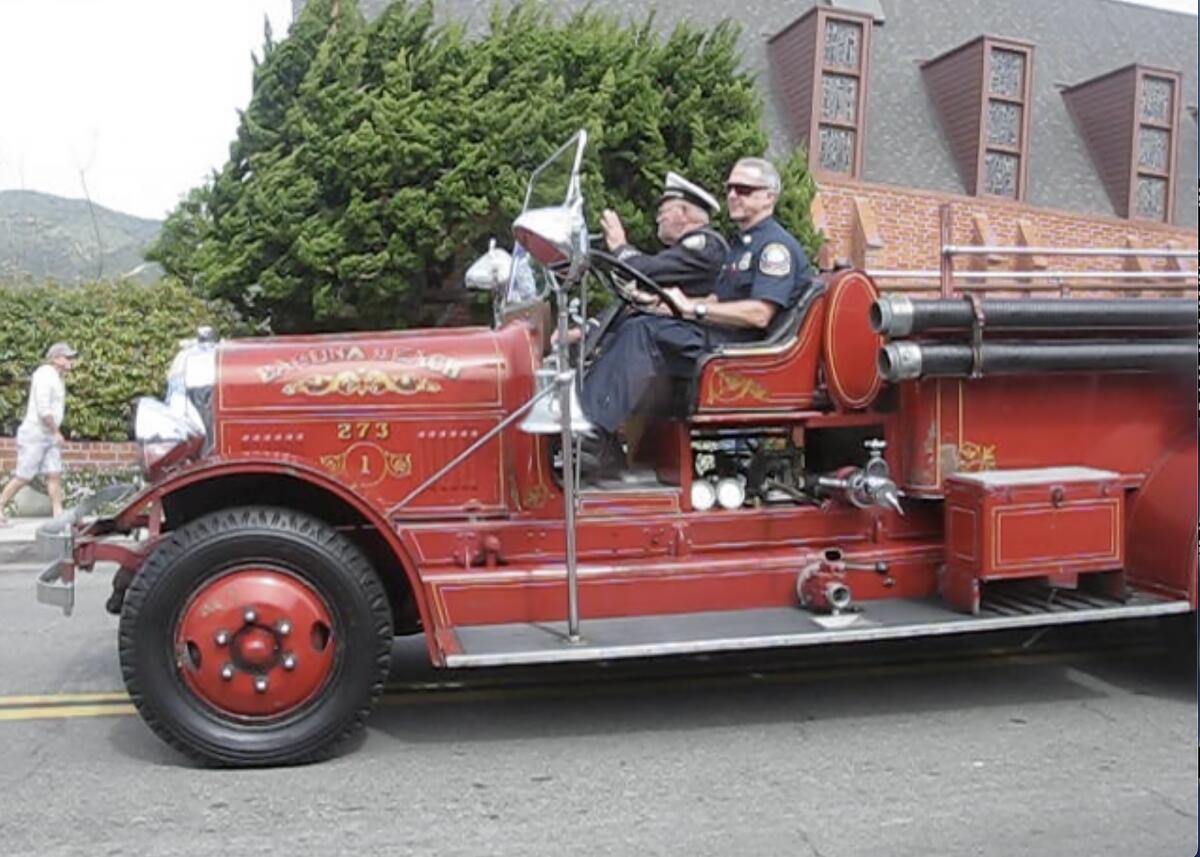 The Laguna Beach fire department's 1931 Seagrave fire engine participates in the 2017 Patriots Day Parade.