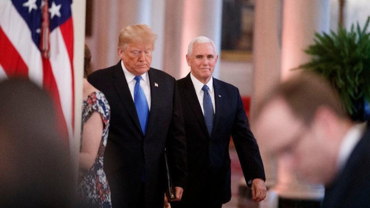 President Trump and Vice President Mike Pence arrive for a post-election news conference at the White House on Nov. 7.