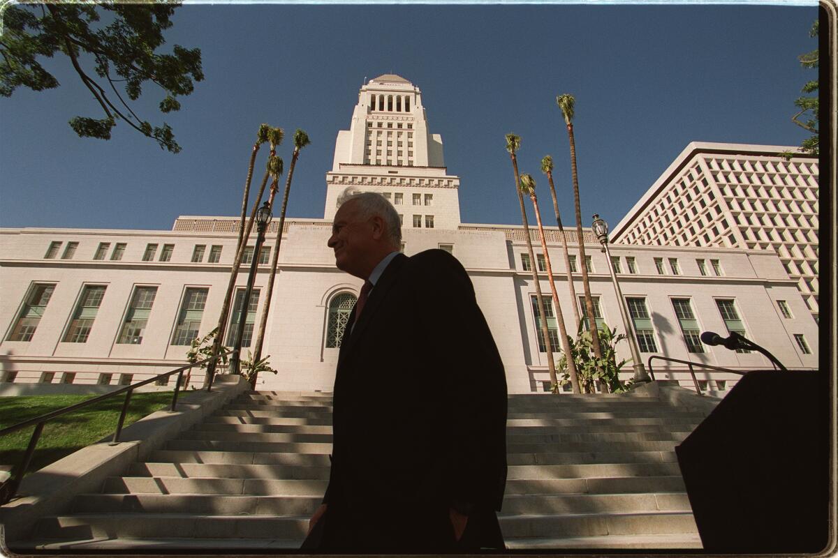 Richard Riordan leaves one of his final news conferences as mayor of L.A. on June 29, 2001. 