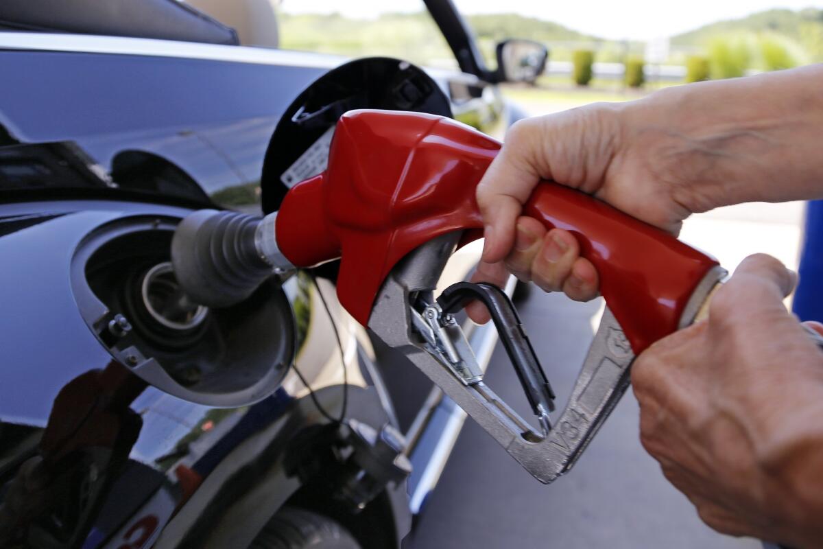 A 12-cent per-gallon increase in the gasoline tax on Nov. 1 will be felt at the pump by drivers, but experts say that gas prices won't automatically rise by 12 cents a gallon.