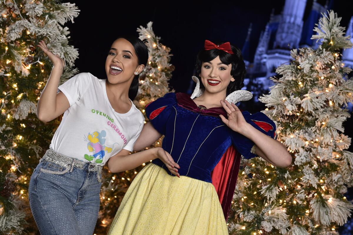 Singer, songwriter and actress Becky G poses with Snow White at Magic Kingdom Park at Walt Disney World Resort in Lake Buena Vista, Fla., Sunday, Nov. 11, 2018, during a taping of “The Wonderful World of Disney: Magical Holiday Celebration” on ABC November 29, 9-11 p.m. ET, on The ABC Television Network. (Mark Ashman, photographer)