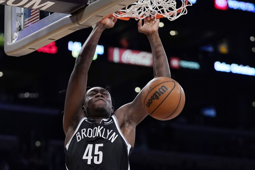 Brooklyn Nets forward Sekou Doumbouya dunks during a preseason NBA basketball game against the Los Angeles Lakers