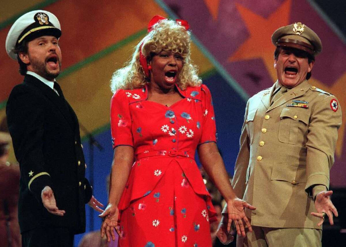 Robin Williams was at his most memorable doing manic comedy. He's pictured here at right teaming up with Billy Crystal and Whoopi Goldberg on a "Comic Relief" fundraiser.