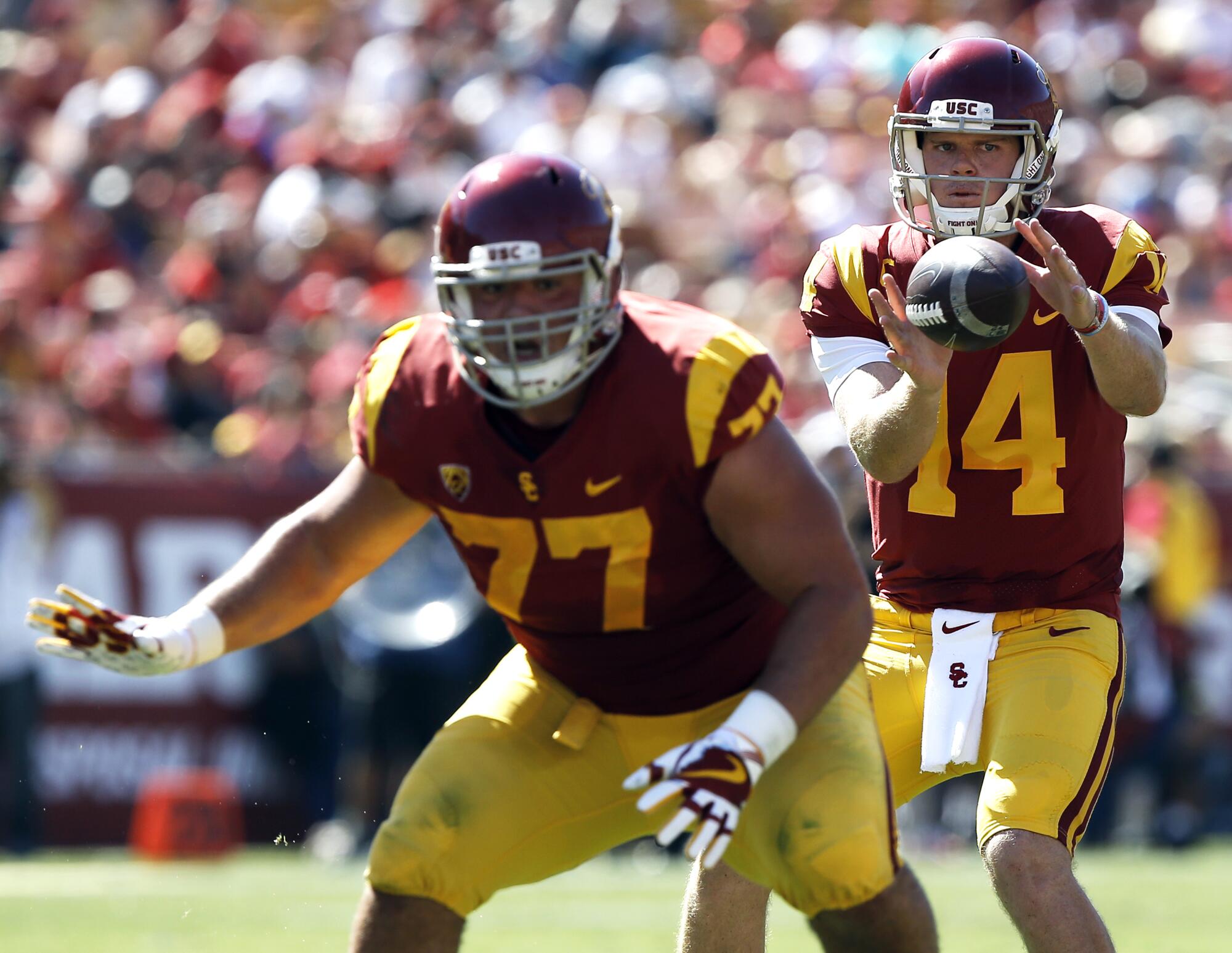 USC guard Chris Brown protects quarterback Sam Darnold during a game