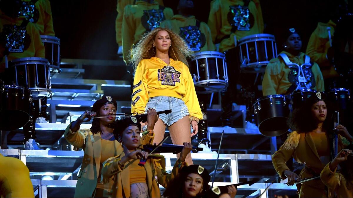 Beyoncé performs onstage Saturday night during the first weekend of the 2018 Coachella Valley Music and Arts Festival in Indio, Calif.
