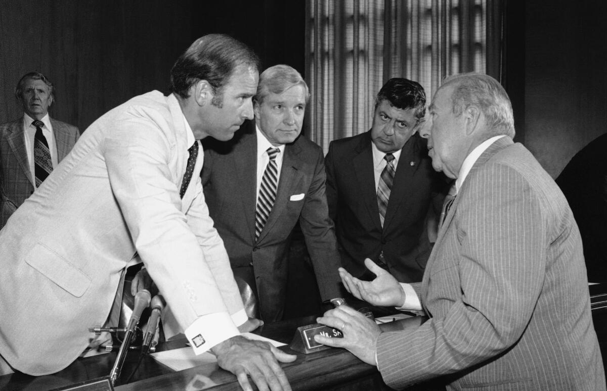Secretary of State designate George P. Shultz, right, with members of the Senate Foreign Relations Committee in 1982.