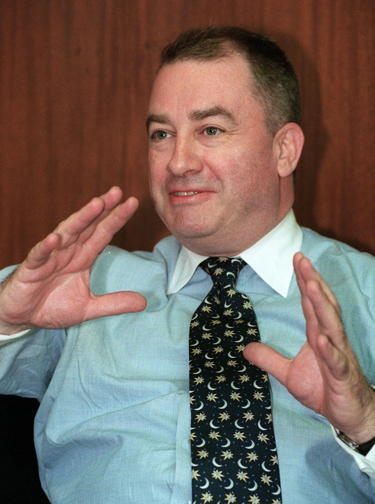 FILE - Los Angeles Times Editor Michael Parks speaks during an interview at the Los Angeles offices of the Times Monday, Oct. 13, 1997. Parks, who won a Pulitzer Prize for his reporting on the struggle to end apartheid in South Africa and later led the Los Angeles Times during a tumultuous period that ended when the Chandler family sold the newspaper after a century of control, died on Saturday. He was 78. (AP Photo/Susan Sterner, File)