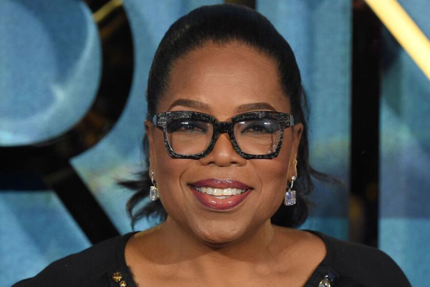 (FILES) In this file photo taken on March 13, 2018 US chat show host Oprah Winfrey poses during the European premiere of A Wrinkle in Time in London . Television personality Oprah Winfrey has agreed to produce shows for Apple as the iPhone maker prepares to make a push into original content. / AFP PHOTO / Anthony HARVEYANTHONY HARVEY/AFP/Getty Images ** OUTS - ELSENT, FPG, CM - OUTS * NM, PH, VA if sourced by CT, LA or MoD **