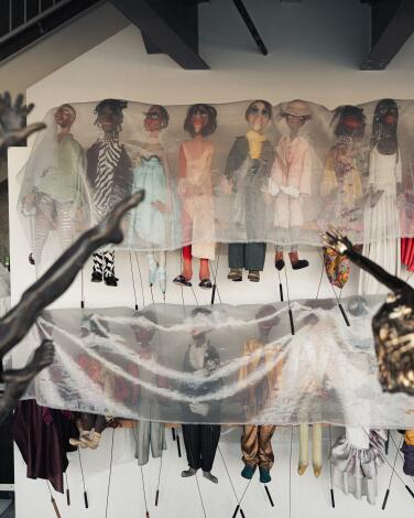 Marionettes in a window of the theater.