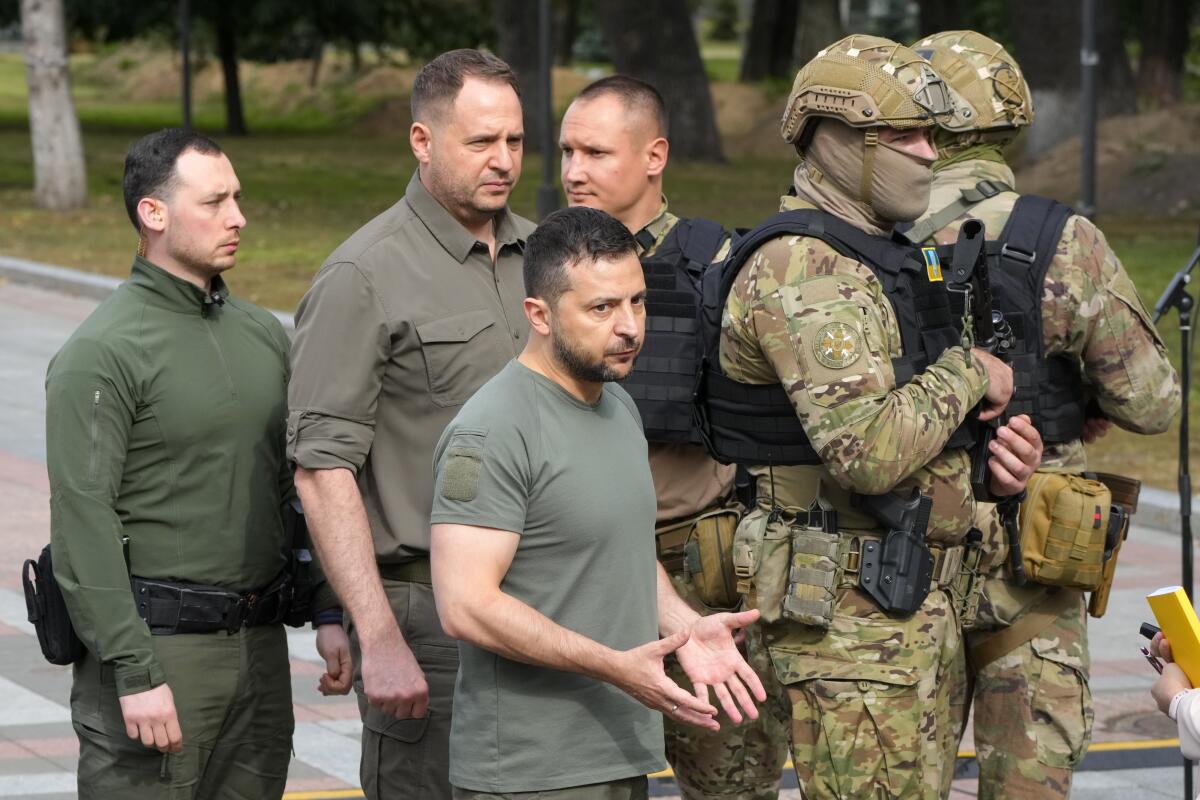 Ukrainian President Volodymyr Zelensky with soldiers and other members of his personal team in Kyiv.