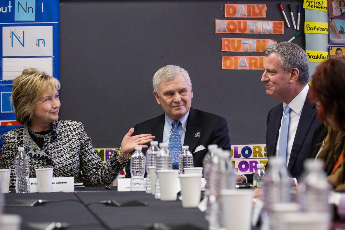 Hillary Rodham Clinton and New York City Mayor Bill de Blasio, right, attend a roundtable discussion held by Univision between parents of elementary school children and politicians in February.