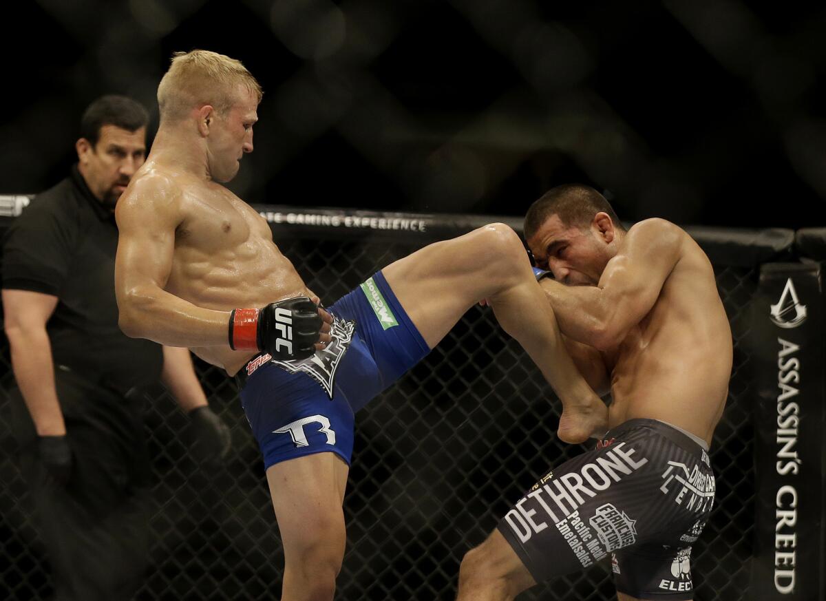 T.J. Dillashaw kicks Joe Soto in the second round.