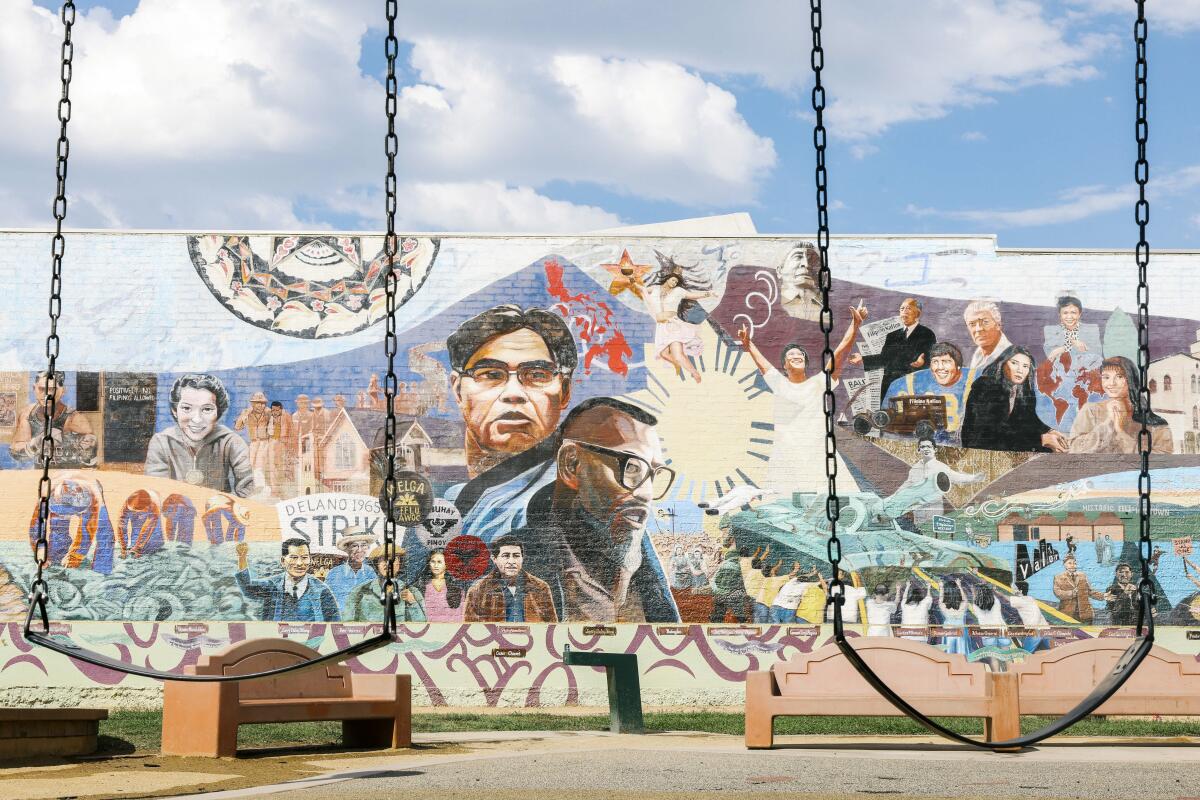 Los Angeles, CA - October 12: A Glorious History, A Golden Legacy Mural is seen at the Unidad Park & Community Center on Wednesday, Oct. 12, 2022 in Los Angeles, CA. The mural was created by artist Eliseo Art Silva in 1995 and represents the forgotten and erased history of Filipino Americans. (Dania Maxwell / Los Angeles Times)