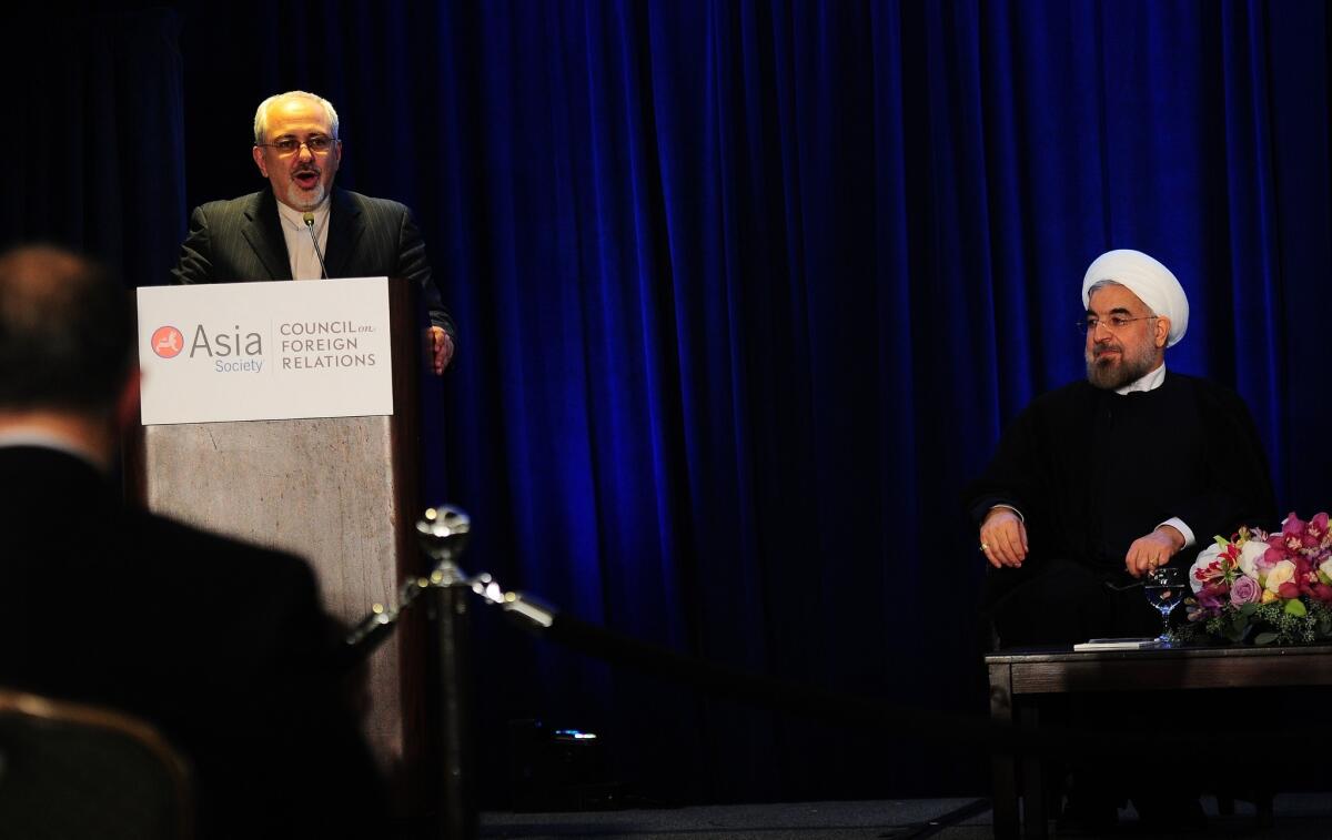 Iranian President Hassan Rouhani, right, and Foreign Minister Mohammad Javad Zarif, shown here at a discussion with academics during their U.S. visit last month, have brought a more conciliatory tone to the debate with Western powers over Iran's nuclear programs. Still, negotiations that resume Tuesday have huge obstacles to overcome to reach a deal that would satisfy foreign fears that Tehran seeks nuclear weapons and Iran's urgent need to get crippling economic sanctions lifted.