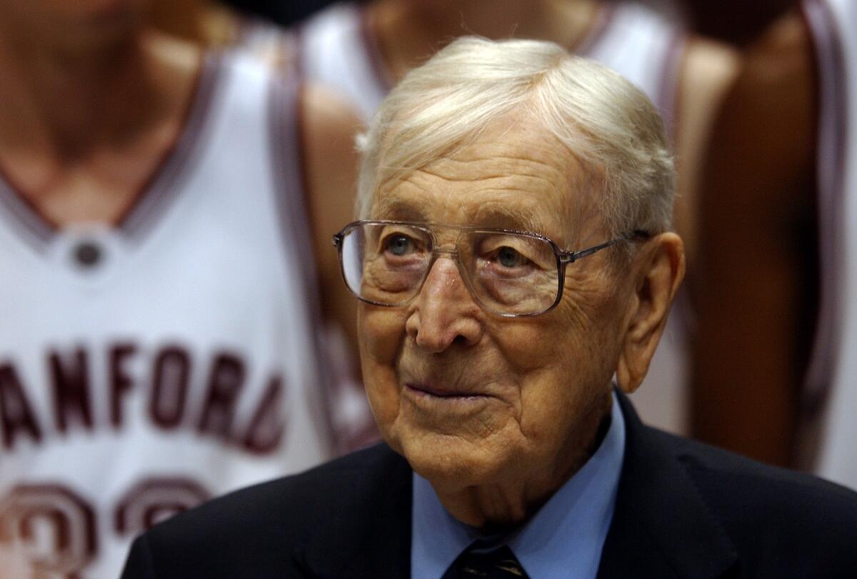  John Wooden catches the inaugural John R. Wooden Classic in December 1994.