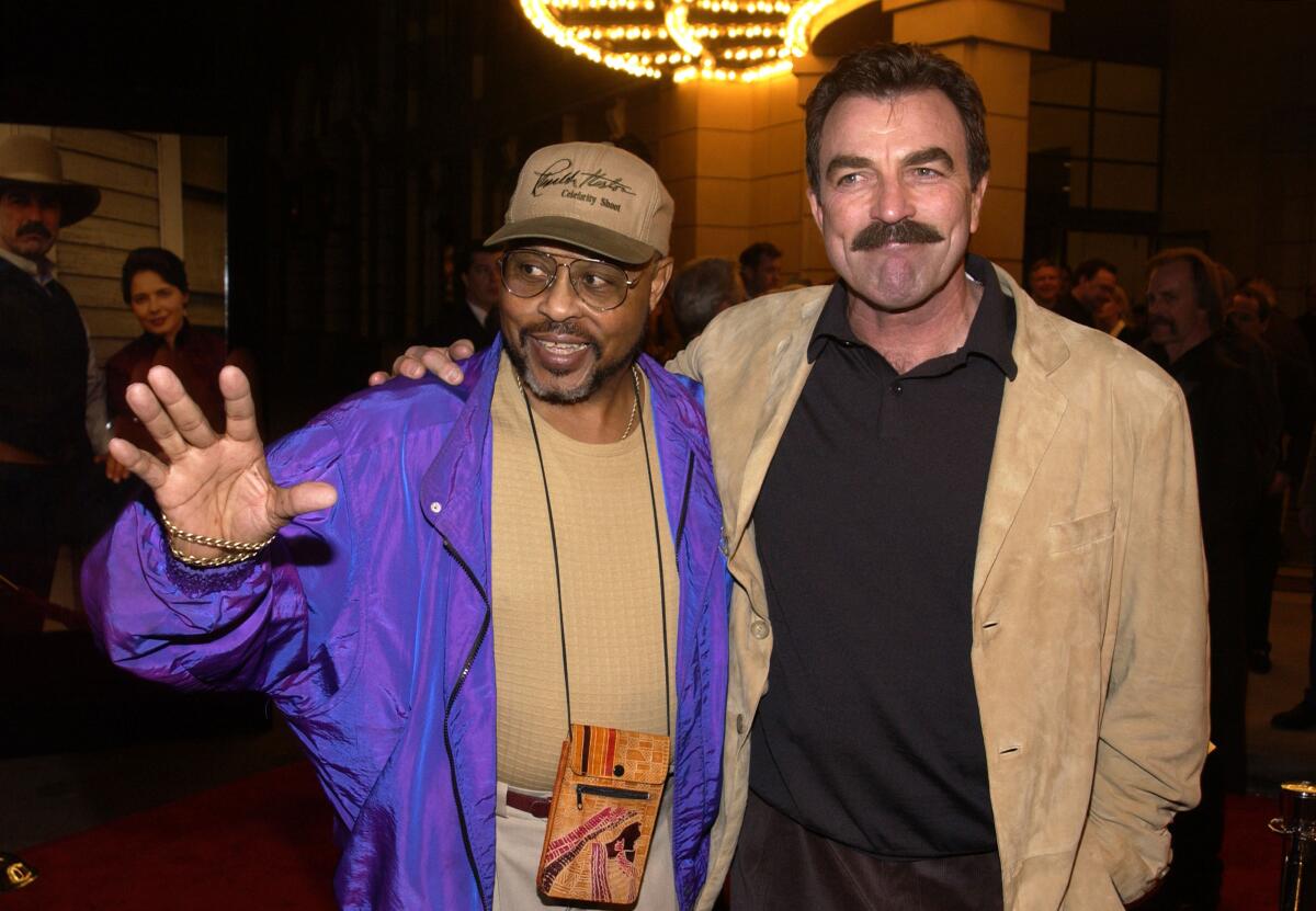 Actors Roger E. Mosley, left, and Tom Selleck.