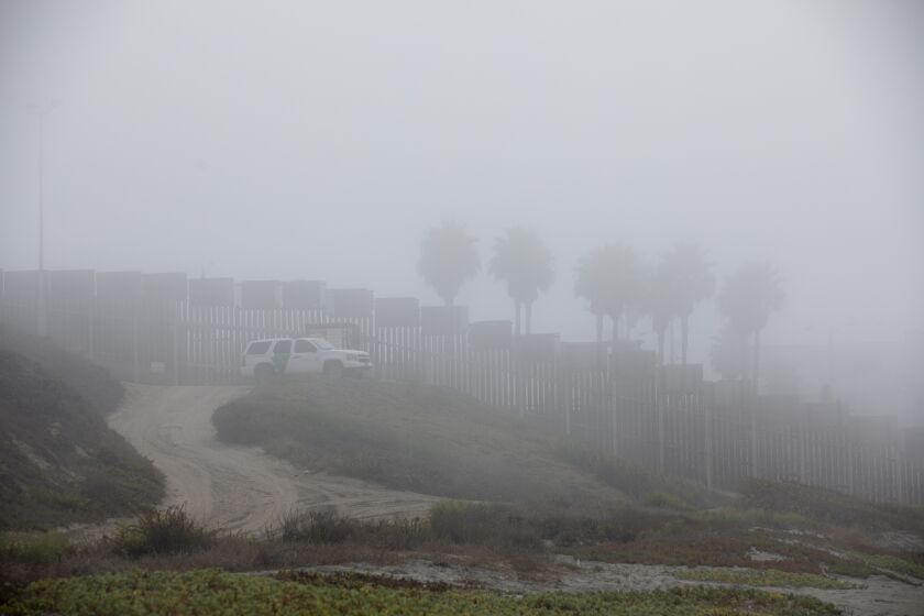 San Diego, CA - September 07: Border Patrol sits at the top of a hill in Border Field State Park on Wednesday, Sept. 7, 2022 in San Diego, CA. (Ana Ramirez / The San Diego Union-Tribune)