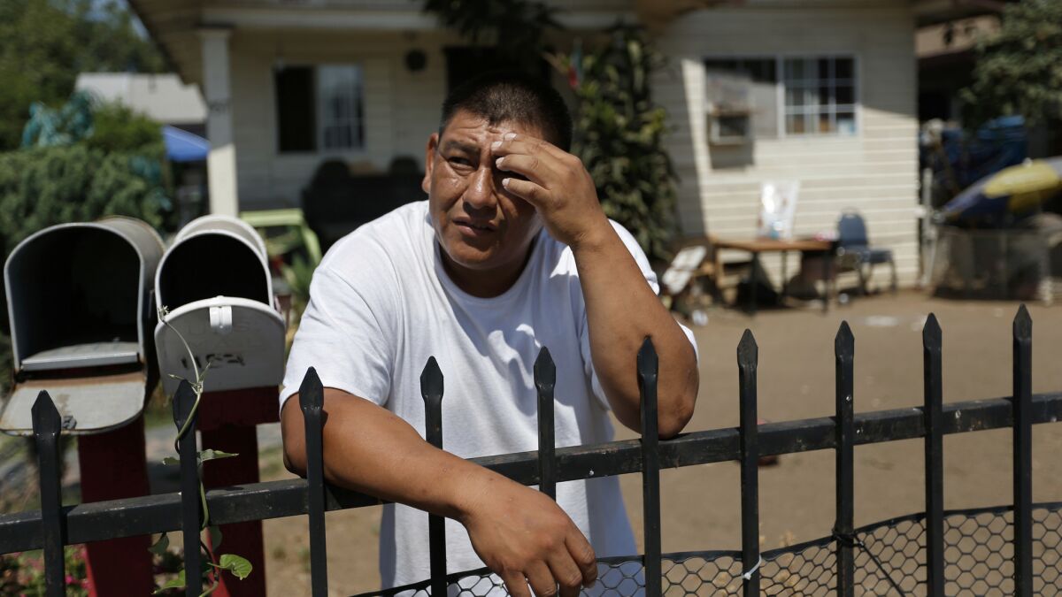 Jose Gomez in the front yard of his home where he has lived for 10-years along the 1100 block of S. Hicks in East Los Angeles. Gomez has had the soil tested for contaminants and is waiting on the results.