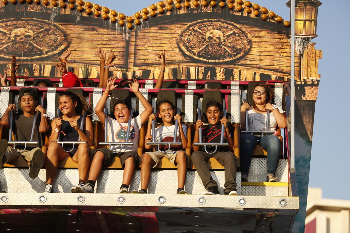 Guests enjoy a carnival ride