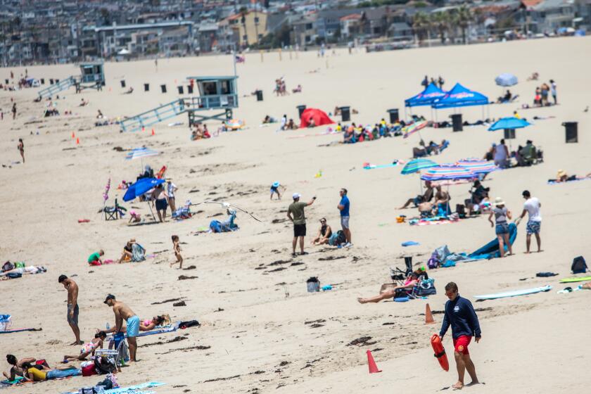 HERMOSA BEACH, CA - JULY 02: Scenes from Hermosa Beach, CA, on Thursday, July 2, 2020, the day before Los Angeles County beaches close for the July 4th holiday, under order from California Gov. Gavin Newsom, in an effort to slow the spread of the coronavirus. (Jay L. Clendenin / Los Angeles Times)