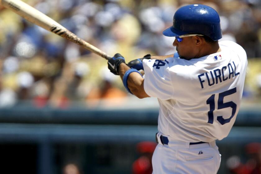 Former Dodgers shortstop Rafael Furcal, who didn't play in the majors in 2013, appeared in nine games last season with the Miami Marlins. Furcal was placed on the voluntary reitred list by the Royals on Tuesday.