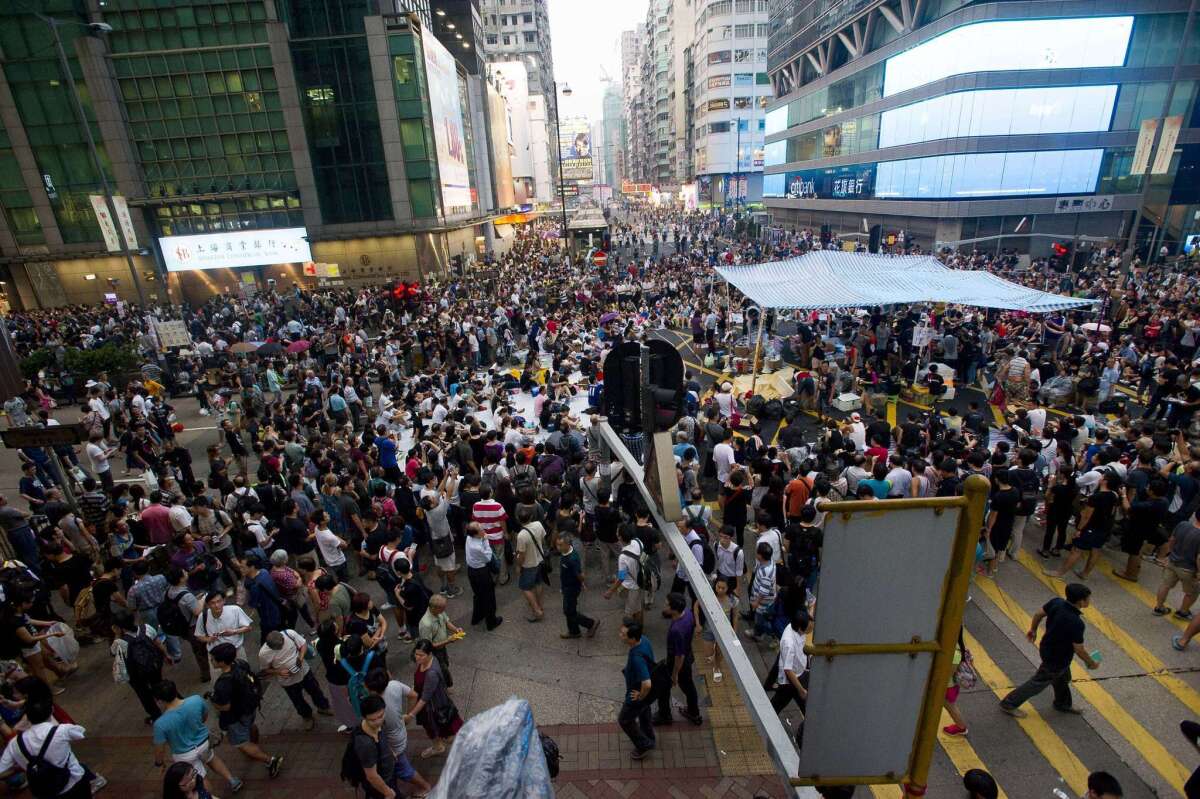 Democracy demonstrators gather in the Mong Kok district of Hong Kong on Tuesday.
