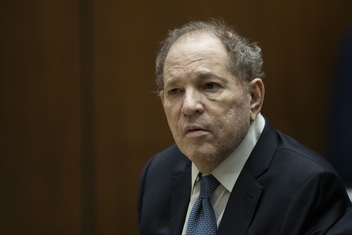 A man wearing a suit in a courtroom