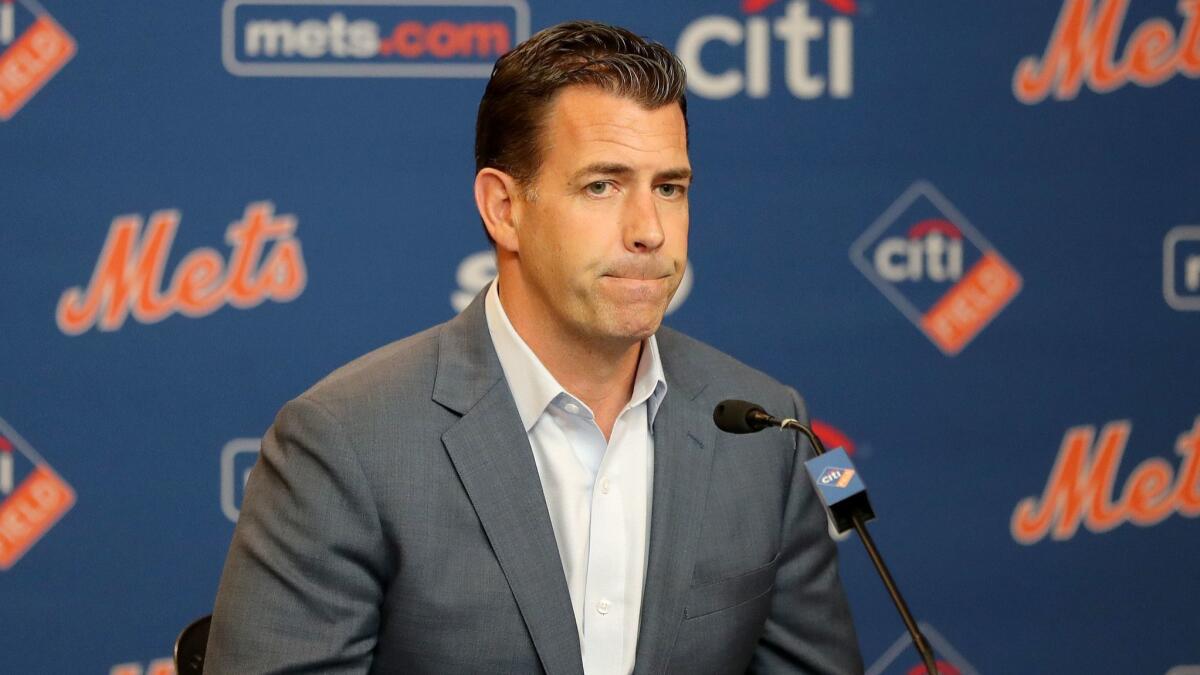 New York Mets general manager Brodie Van Wagenen answers questions during a news conference on May 20.