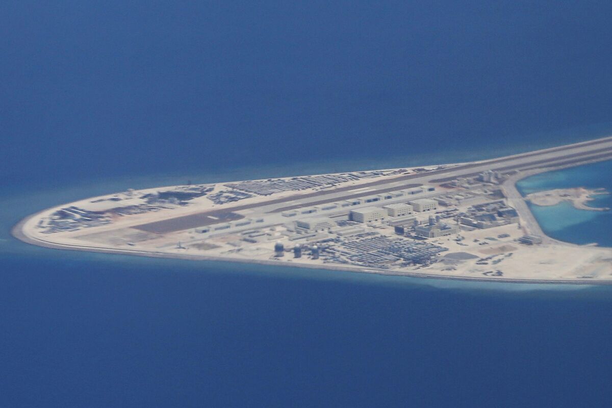 An aerial view of Subi Reef in the South China Sea, with visible airstrip.