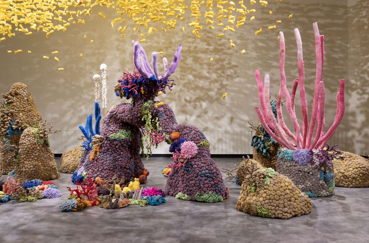 An underwater world created of knitted materials.