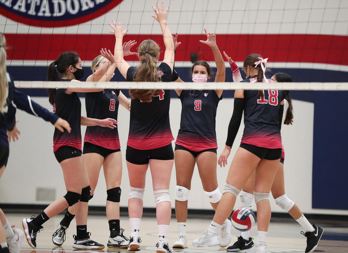 Ocean View celebrates a point in the first round of the Division 6 playoffs against Bolsa Grande on Wednesday.