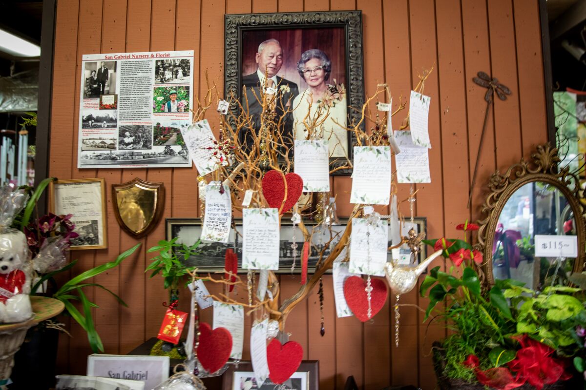 Hearts and notes decorate a portrait of an elderly couple.