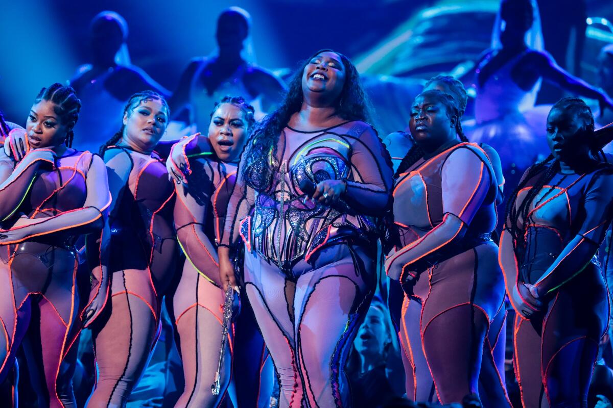 Lizzo opened the Grammy Awards with a medley of hits from her album “‘Cuz I Love You.”