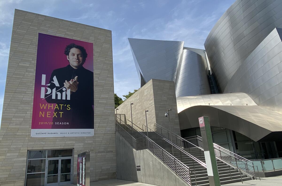 A banner on Walt Disney Concert Hall reads "What's Next." 