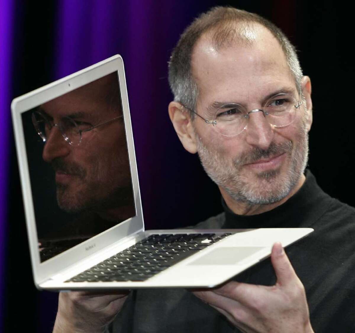 He's no longer with us, guys, get over it: Steve Jobs with the MacBook Air, 2008.