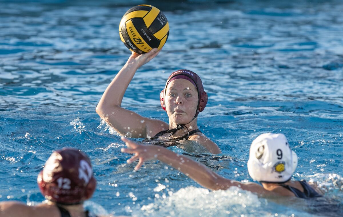Laguna Beach's Presley Jones looks for an open shot against Newport Harbor's Chloe Rizof during Tuesday's match.