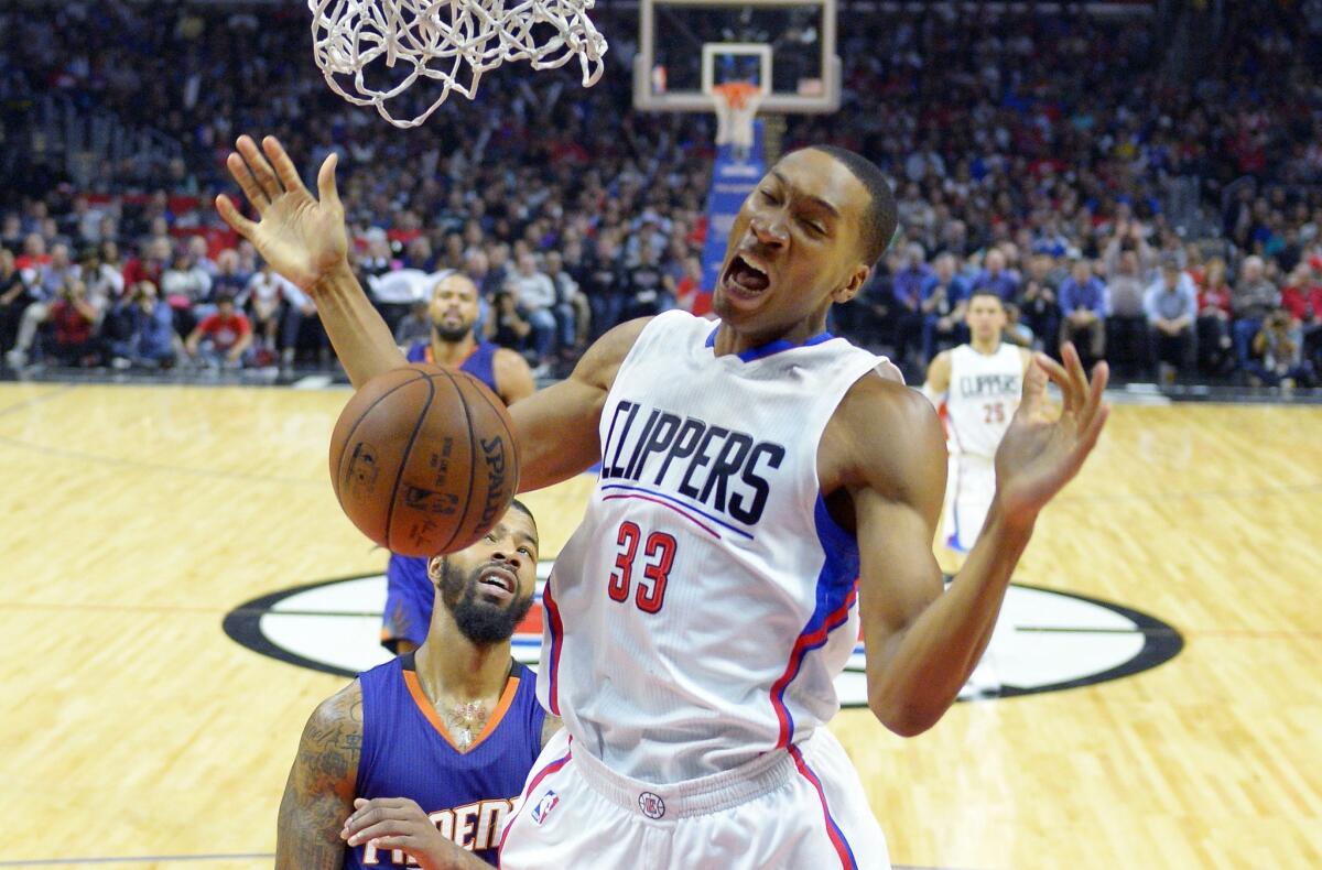 Los Angeles Clippers guard Wesley Johnson dunks against Phonenix.
