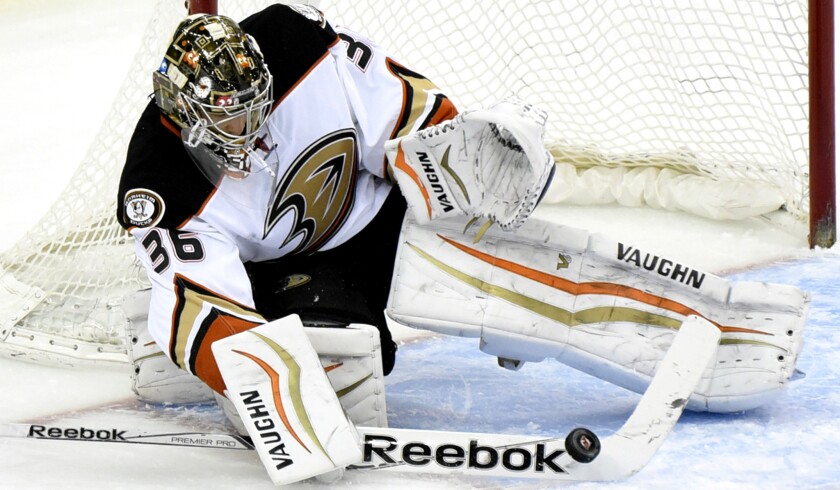Ducks goaltender John Gibson deflects the puck during the second period of a 2-1 victory over the Devils in New Jersey.