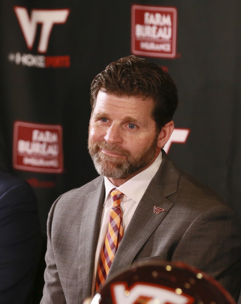 New Virginia Tech NCAA college football head coach Brent Pry is shown during an introductory press conference in Blacksburg Va., Thursday Dec. 2, 2021. (Matt Gentry/The Roanoke Times via AP)